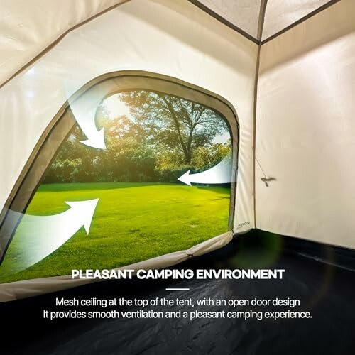 Inside tent view with open door showing green lawn and trees.